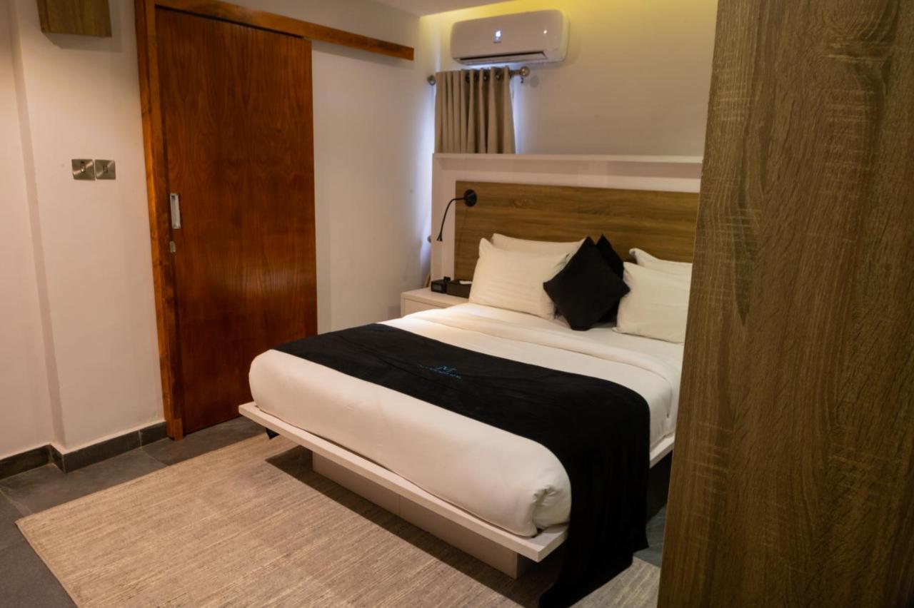 Villa Monument Hotel Aliayabiagba Екстериор снимка