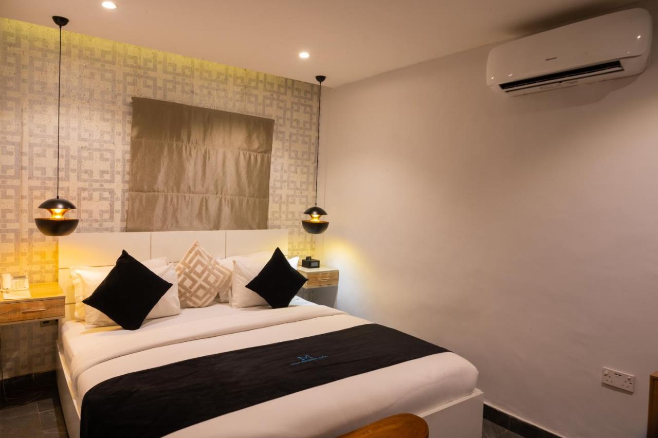Villa Monument Hotel Aliayabiagba Екстериор снимка