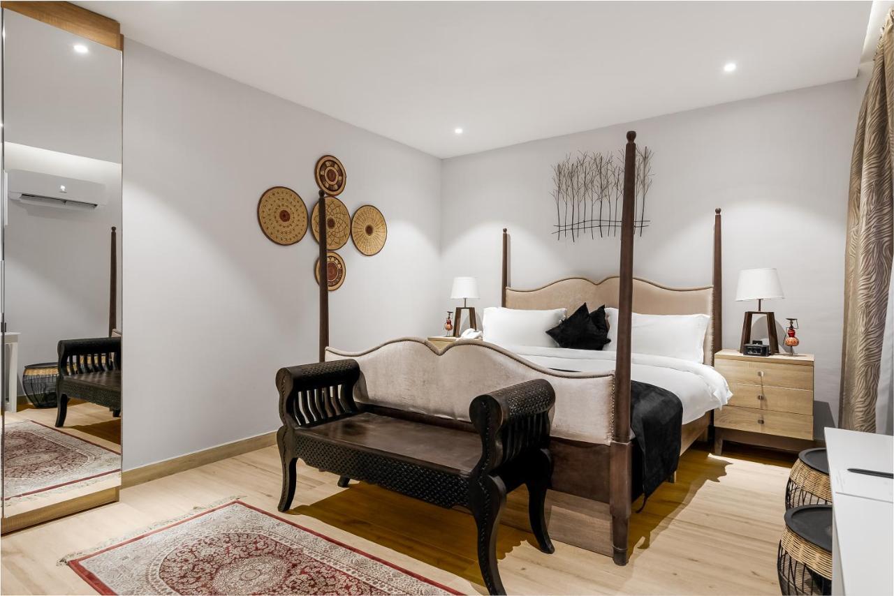 Villa Monument Hotel Aliayabiagba Екстериор снимка