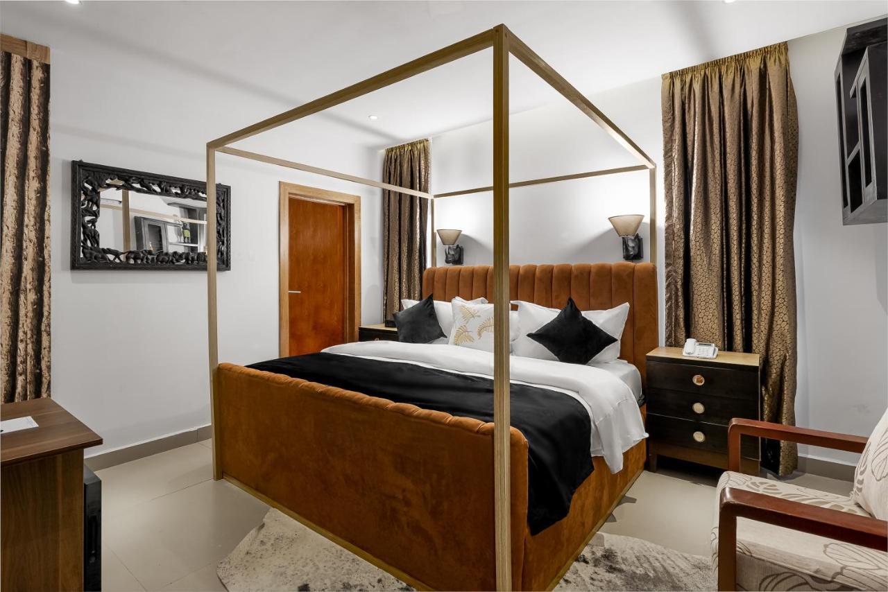 Villa Monument Hotel Aliayabiagba Екстериор снимка